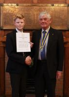 President Tom Garlick presenting Charles O Hodgson with his Cerificate 